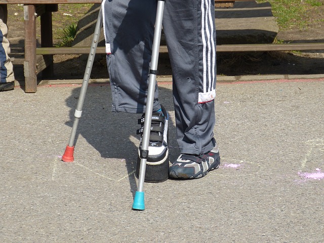 Kid walking with crutches